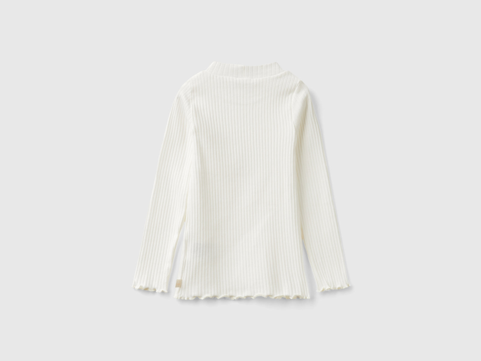 Maglietta slim fit in cotone stretch da bimba bianco panna 2 | Benetton Outlet