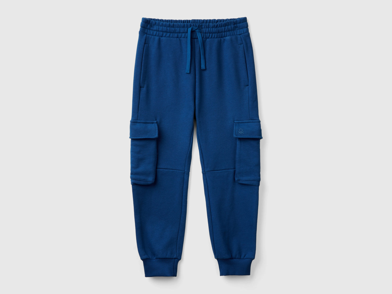 Pantaloni cargo in felpa da bambino blu | Benetton Outlet