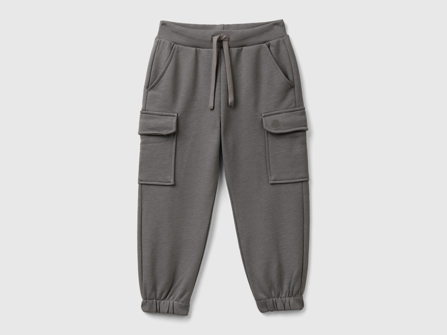 Pantaloni cargo in felpa da bimbo grigio scuro | Benetton Outlet