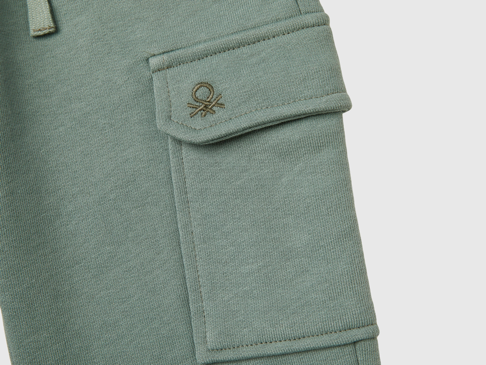 Pantaloni cargo in felpa da bimbo verde chiaro 3 | Benetton Outlet