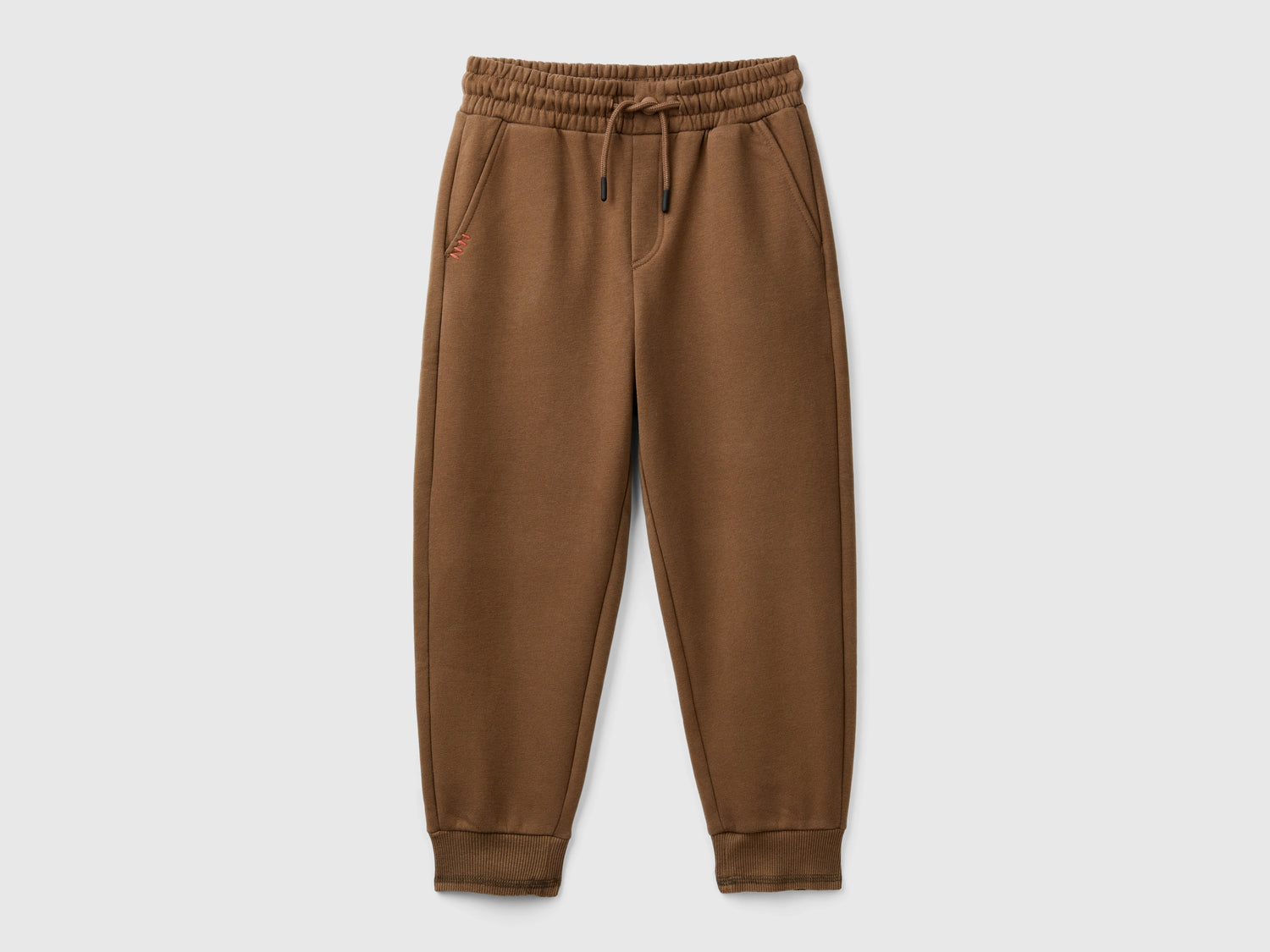 Pantaloni in calda felpa con stampa da bambino marrone | Benetton Outlet