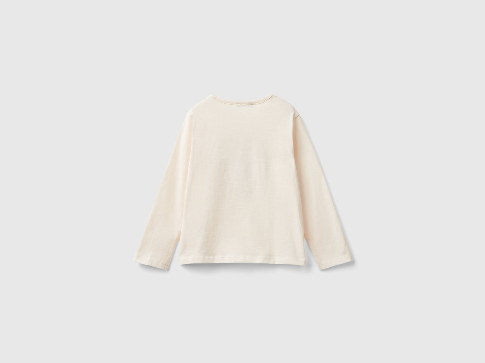 T-shirt con applicazione effetto petali da bimba bianco panna 2 | Benetton Outlet
