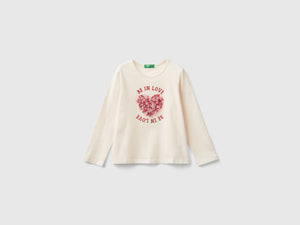 T-shirt con applicazione effetto petali