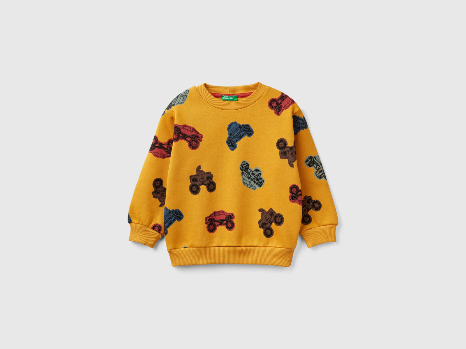 Felpa con stampa trattori da bimbo senape | Benetton Outlet