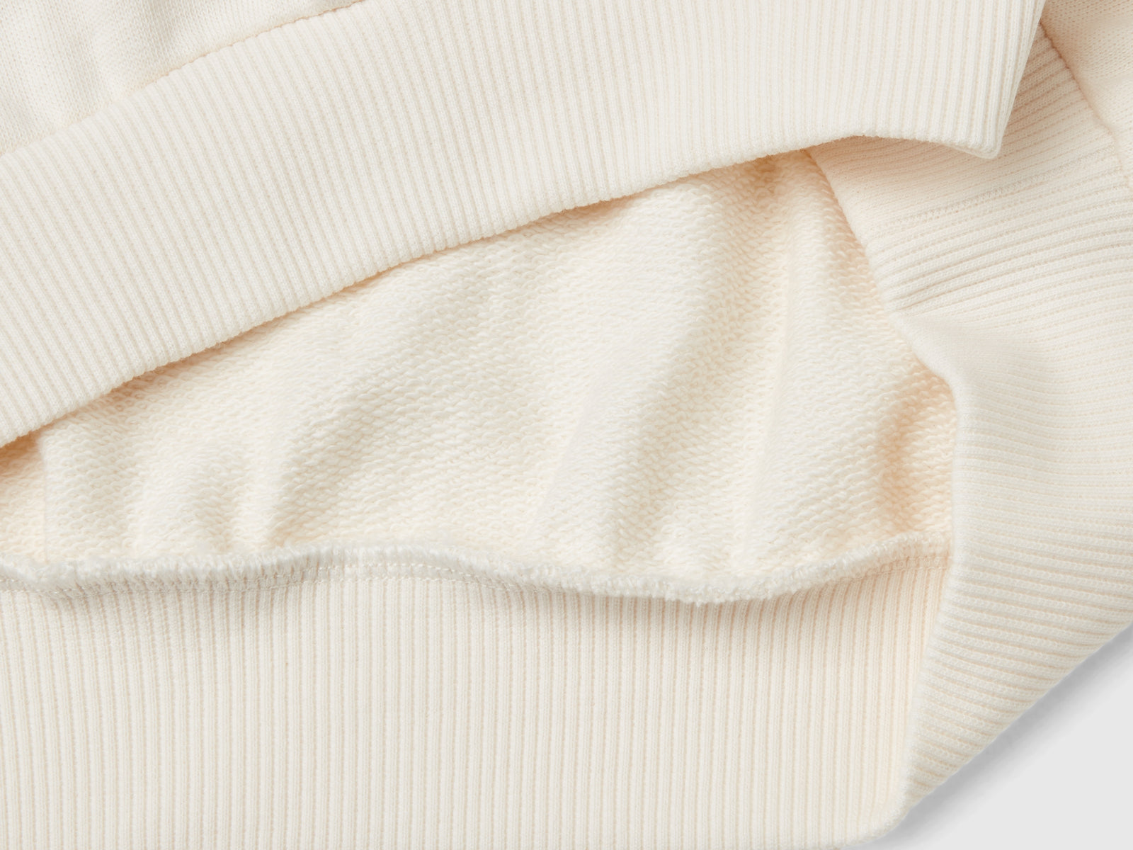 Felpa con paillettes da bambina bianco panna 3 | Benetton Outlet