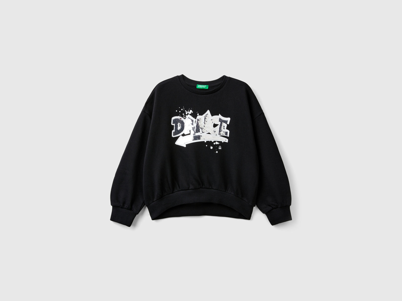 Felpa con paillettes da bambina nero | Benetton Outlet