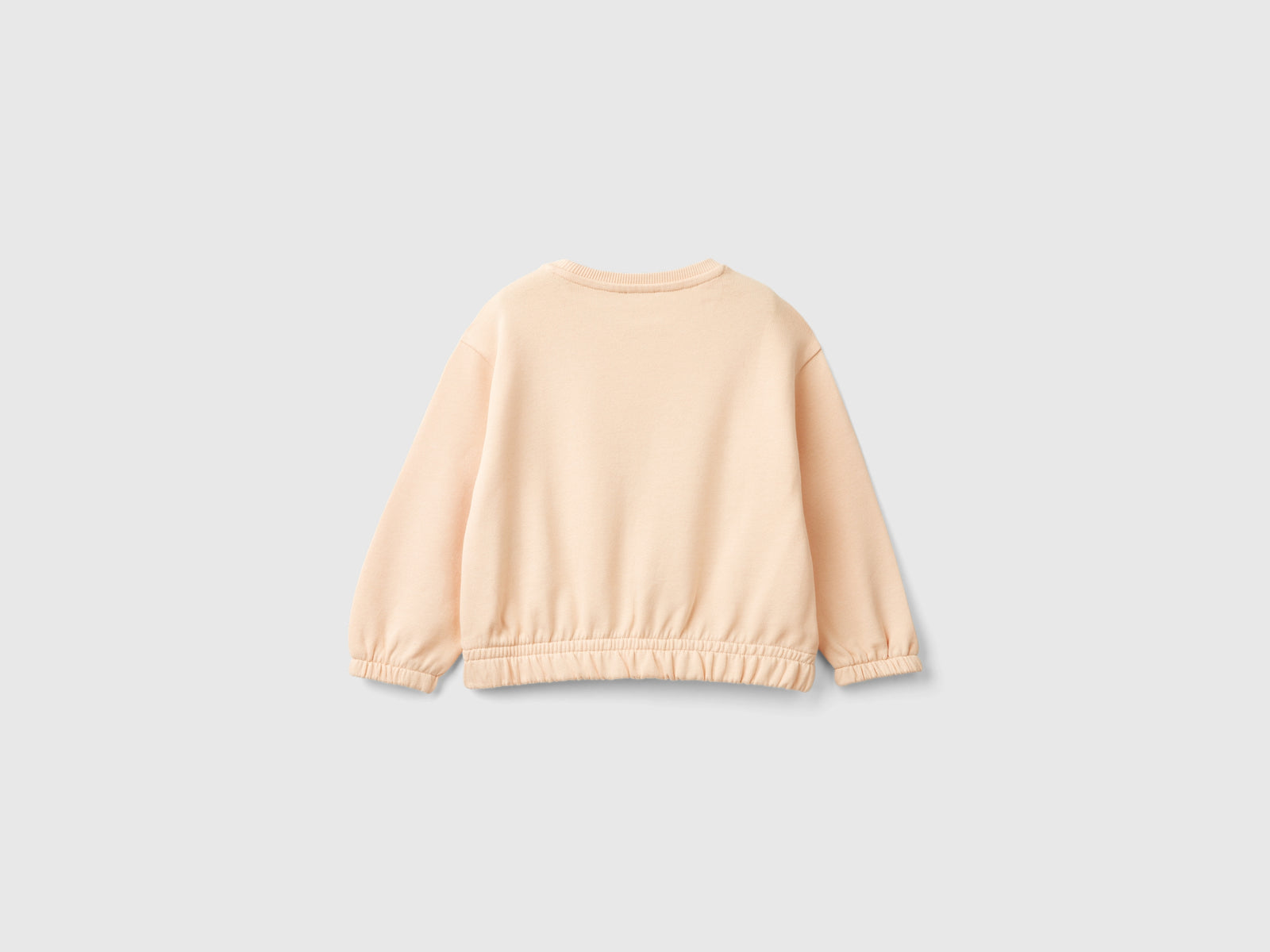 Felpa con stampa e paillettes da bimba rosa tenue 2 | Benetton Outlet