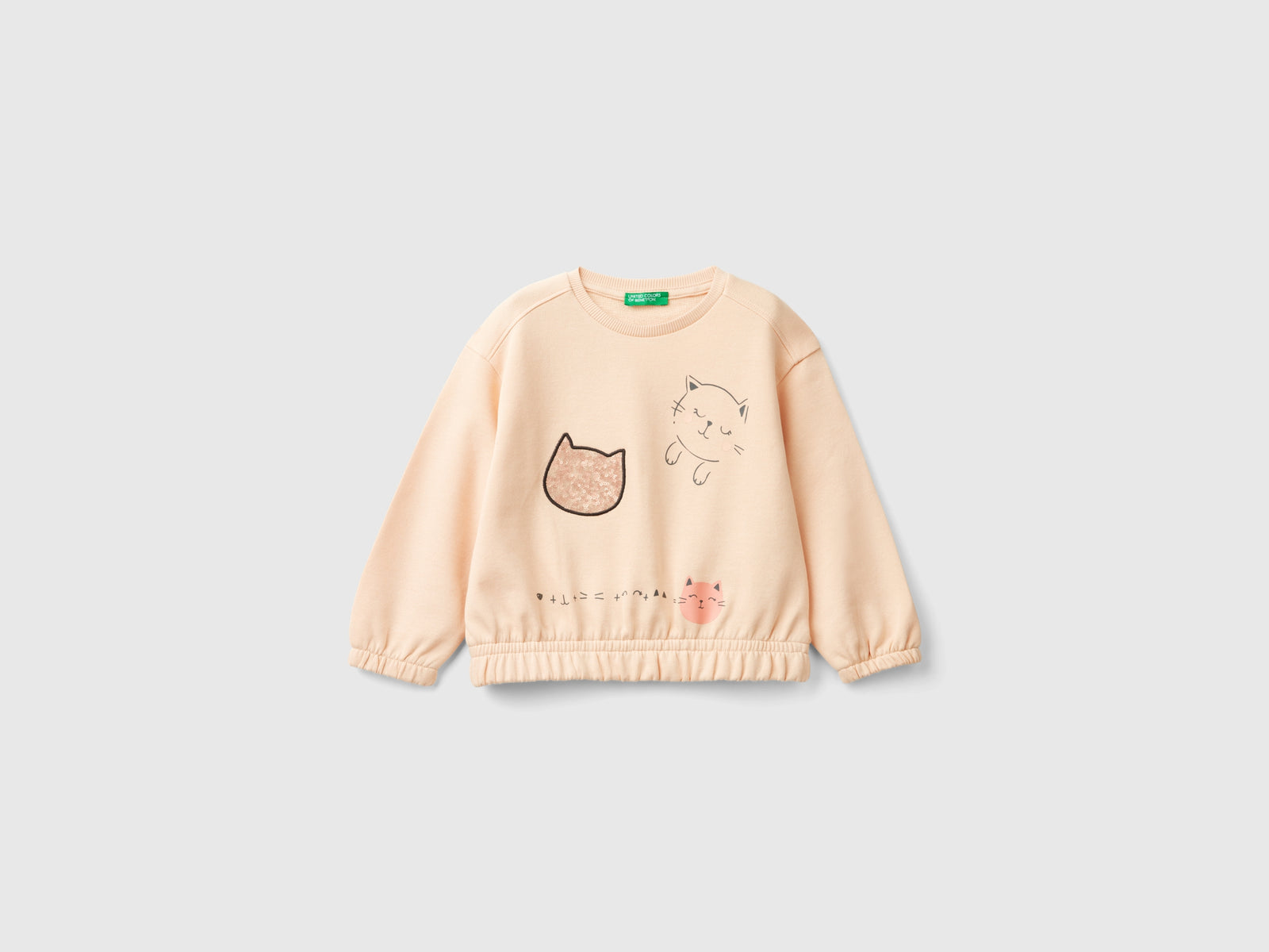 Felpa con stampa e paillettes da bimba rosa tenue | Benetton Outlet