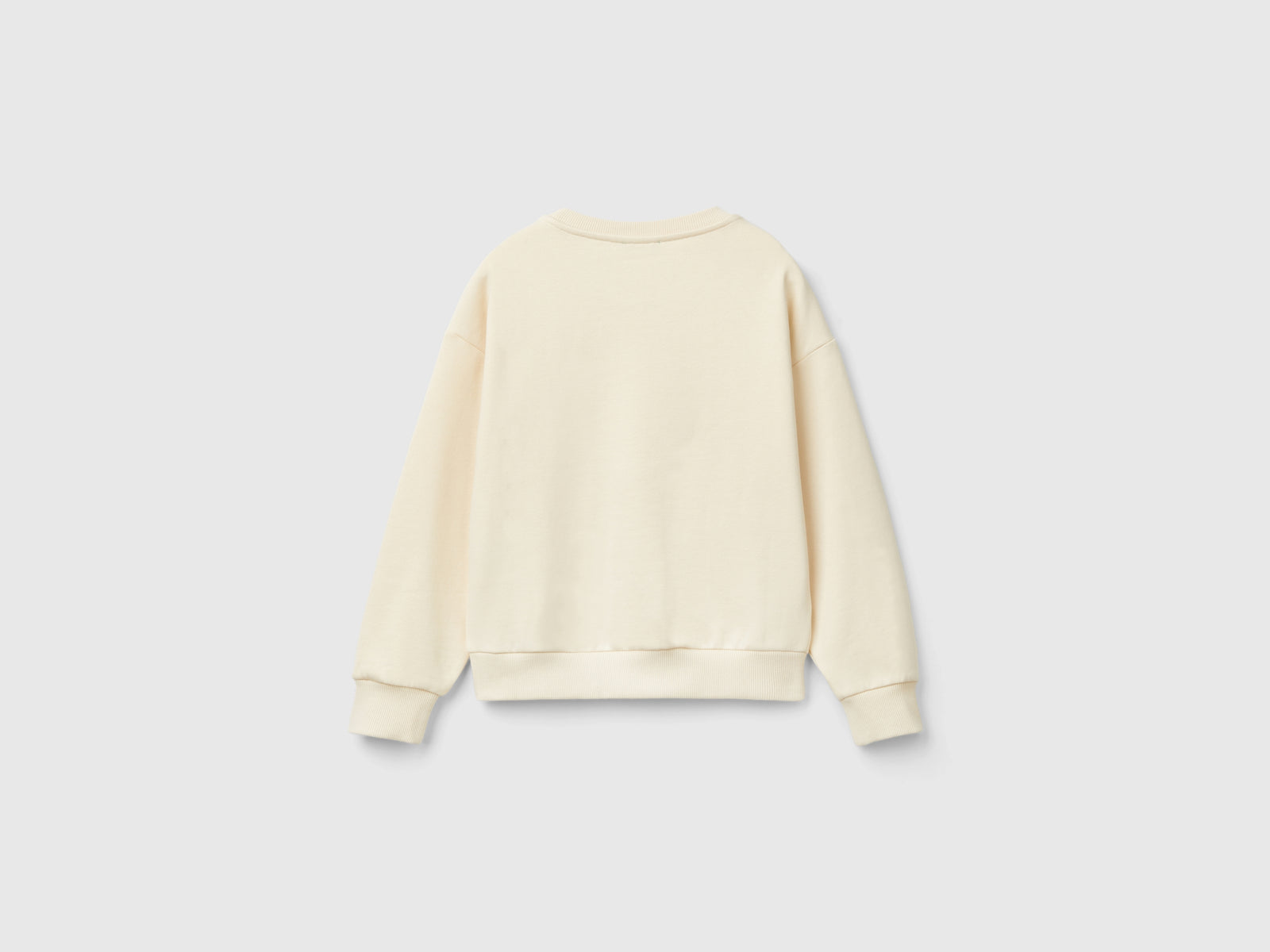 Felpa con paillettes cuore da bambina bianco panna 2 | Benetton Outlet