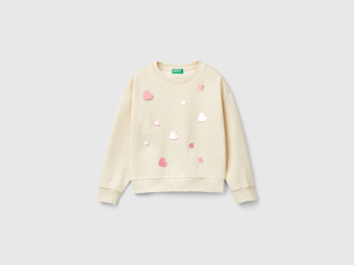 Felpa con paillettes cuore