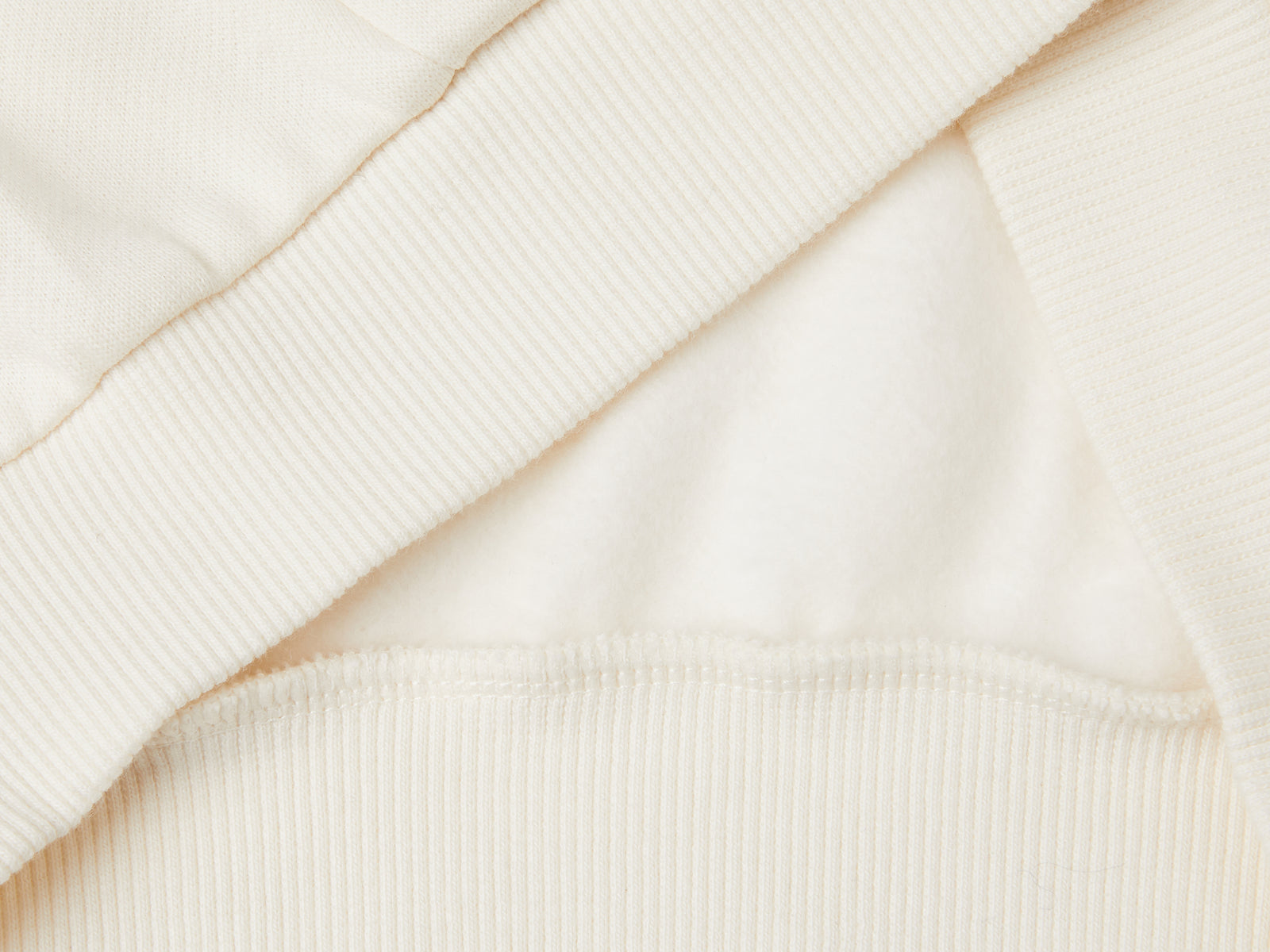 Felpa con ricamo in lurex da bambina bianco panna 3 | Benetton Outlet