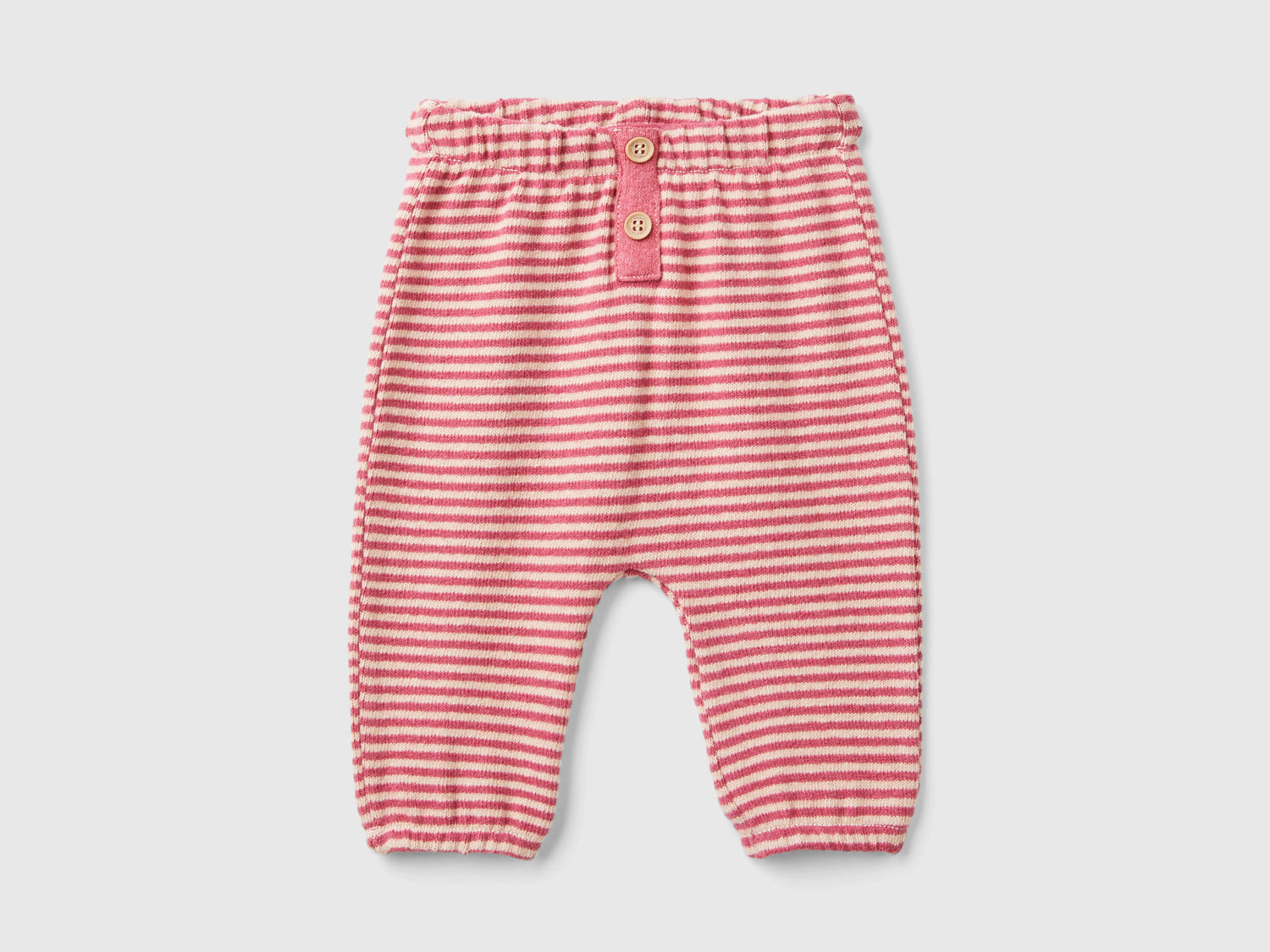 Pantaloni a righe in misto cotone riciclato da neonato rosso | Benetton Outlet