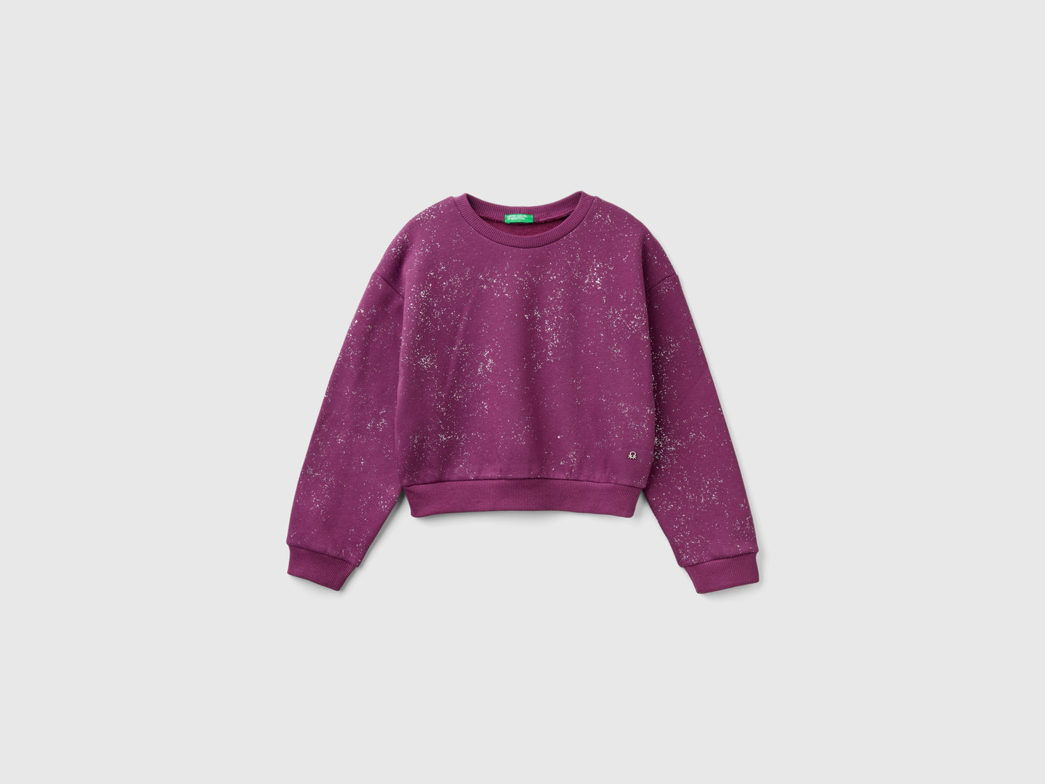 Felpa over fit con brillantini da bambina viola | Benetton Outlet