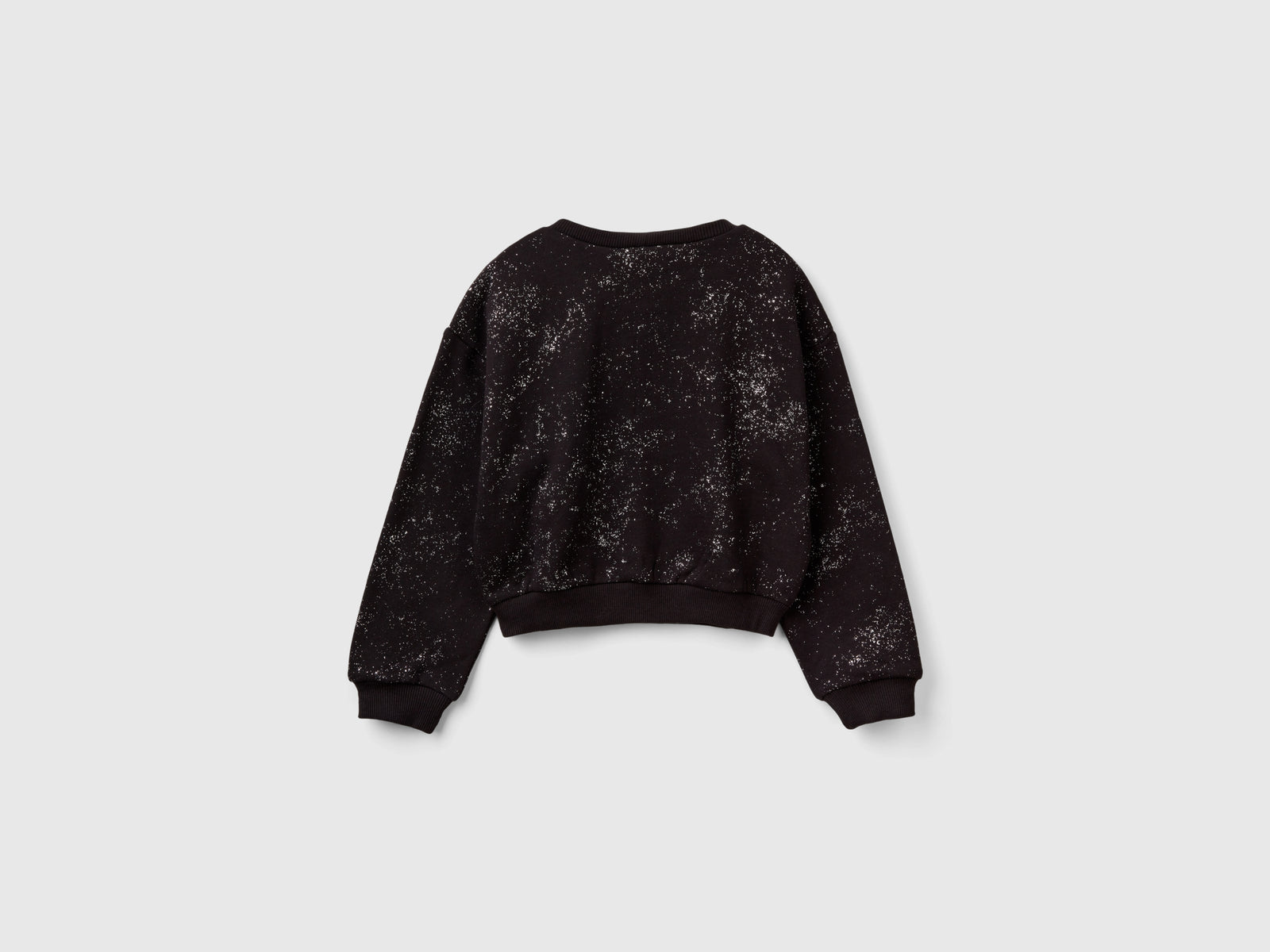 Felpa over fit con brillantini da bambina grigio scuro 2 | Benetton Outlet