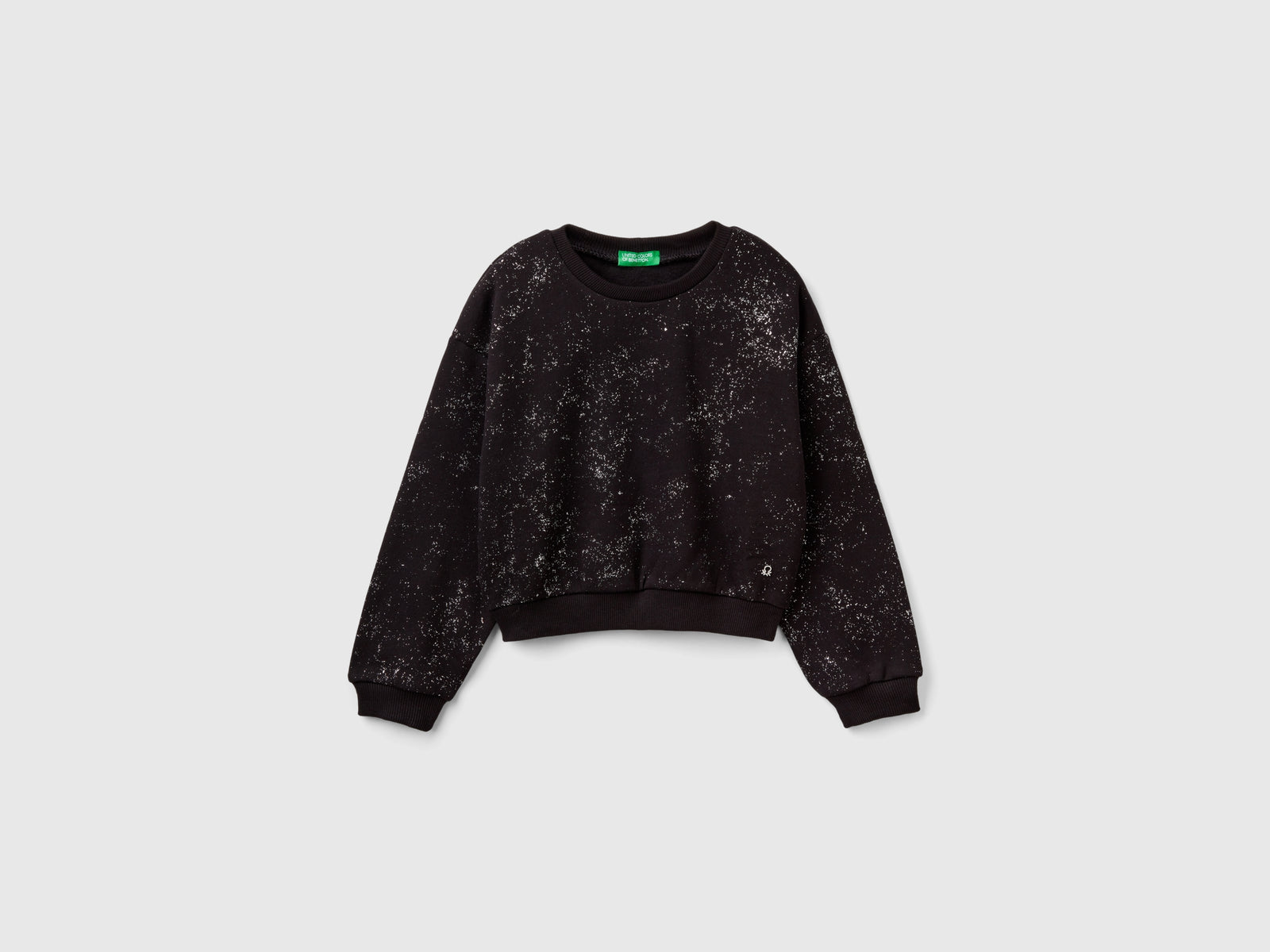 Felpa over fit con brillantini da bambina grigio scuro | Benetton Outlet