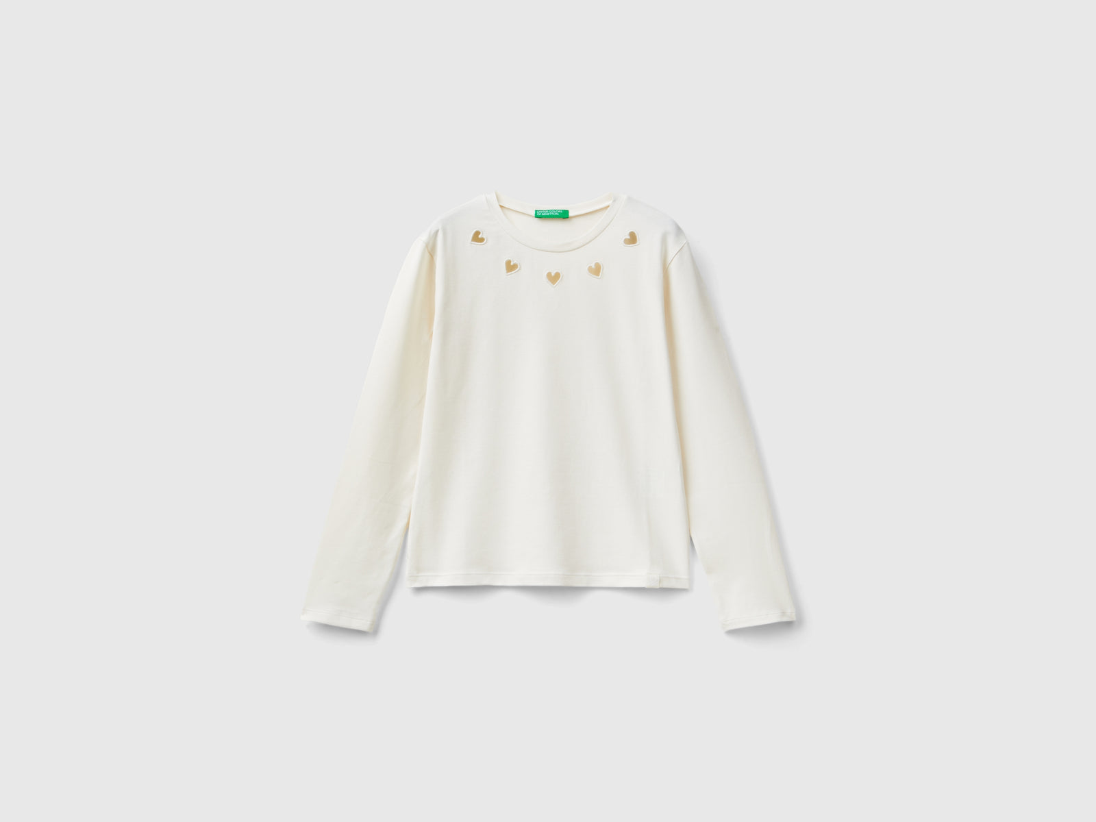 T-shirt con cuori cut out da bambina bianco panna | Benetton Outlet