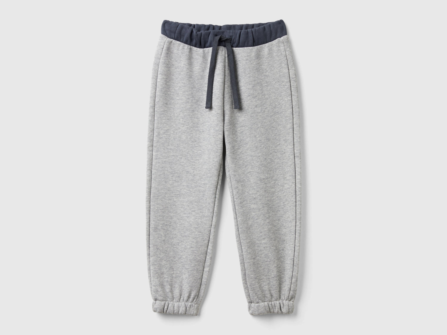Joggers con coulisse da bimbo grigio chiaro | Benetton Outlet