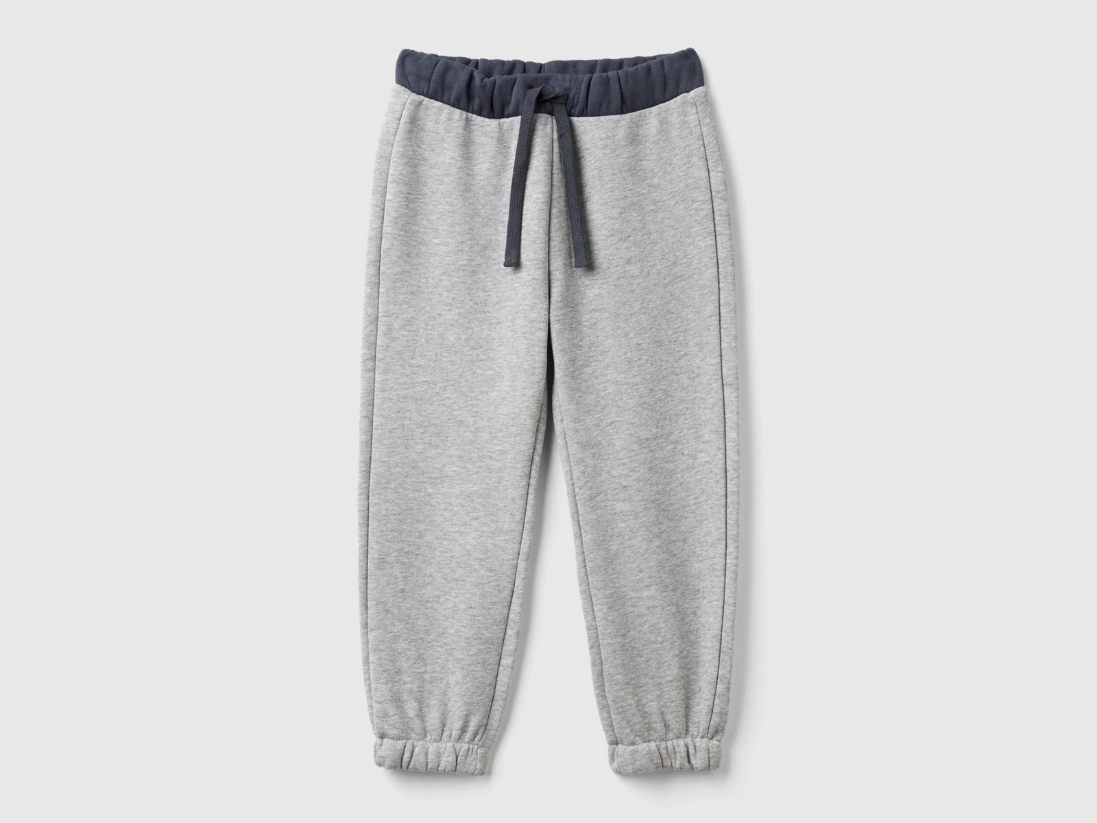 Joggers con coulisse da bimbo grigio chiaro | Benetton Outlet