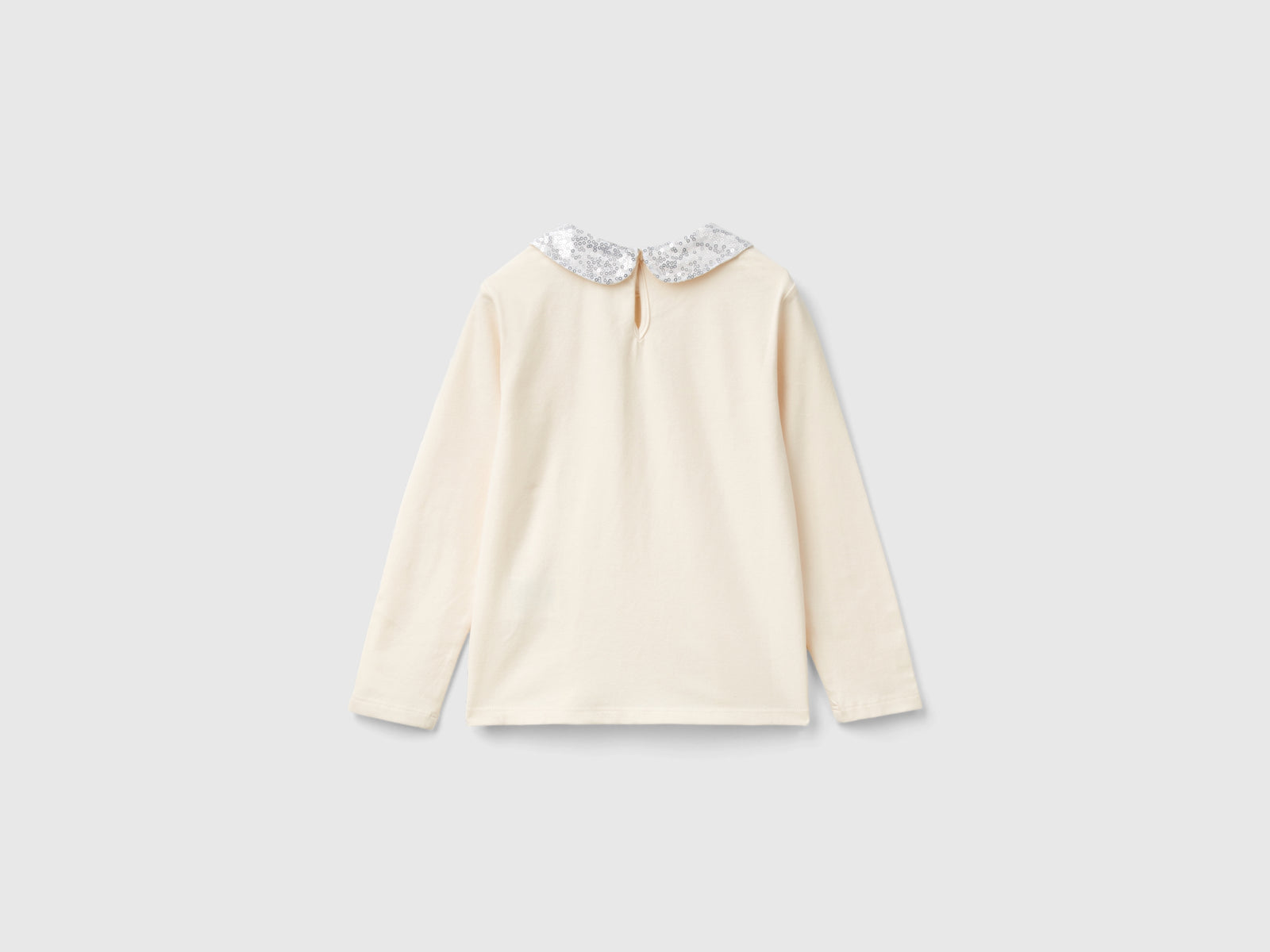 Maglietta con colletto paillettes da bimba bianco panna 2 | Benetton Outlet