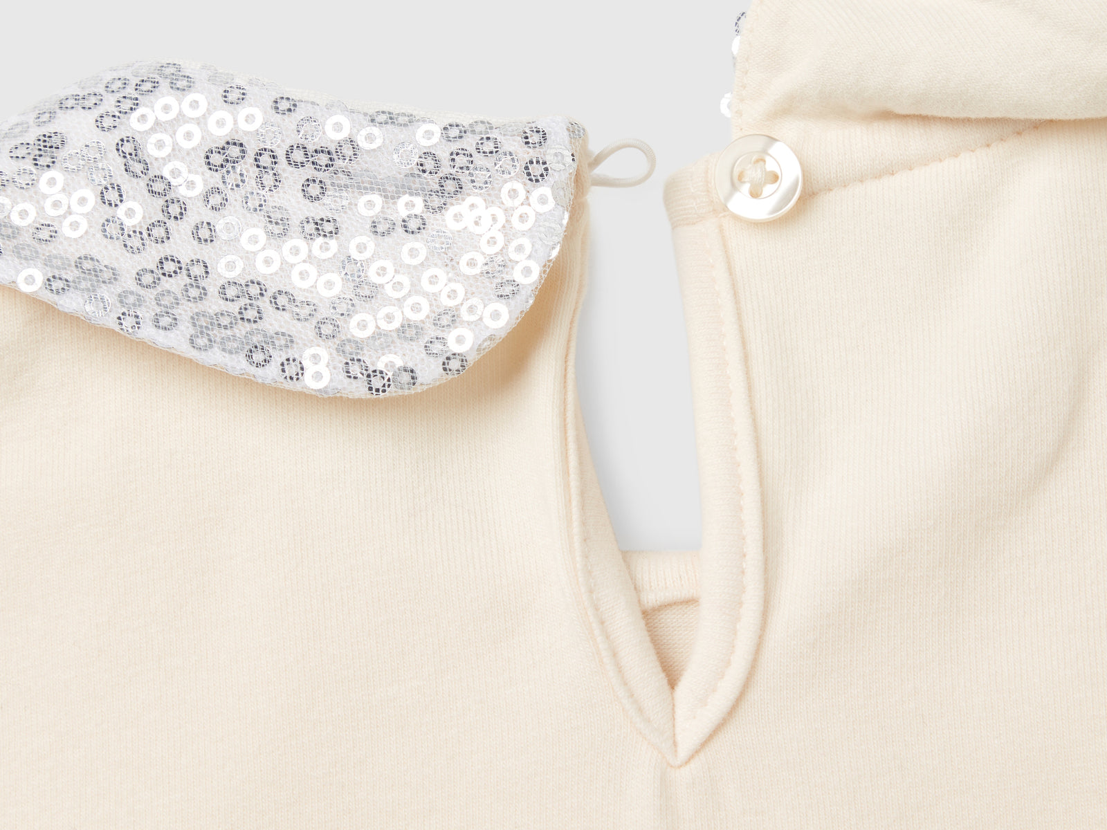 Maglietta con colletto paillettes da bimba bianco panna 3 | Benetton Outlet