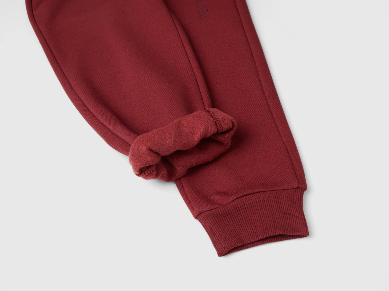 Pantaloni in calda felpa con stampa da bambino bordeaux 3 | Benetton Outlet