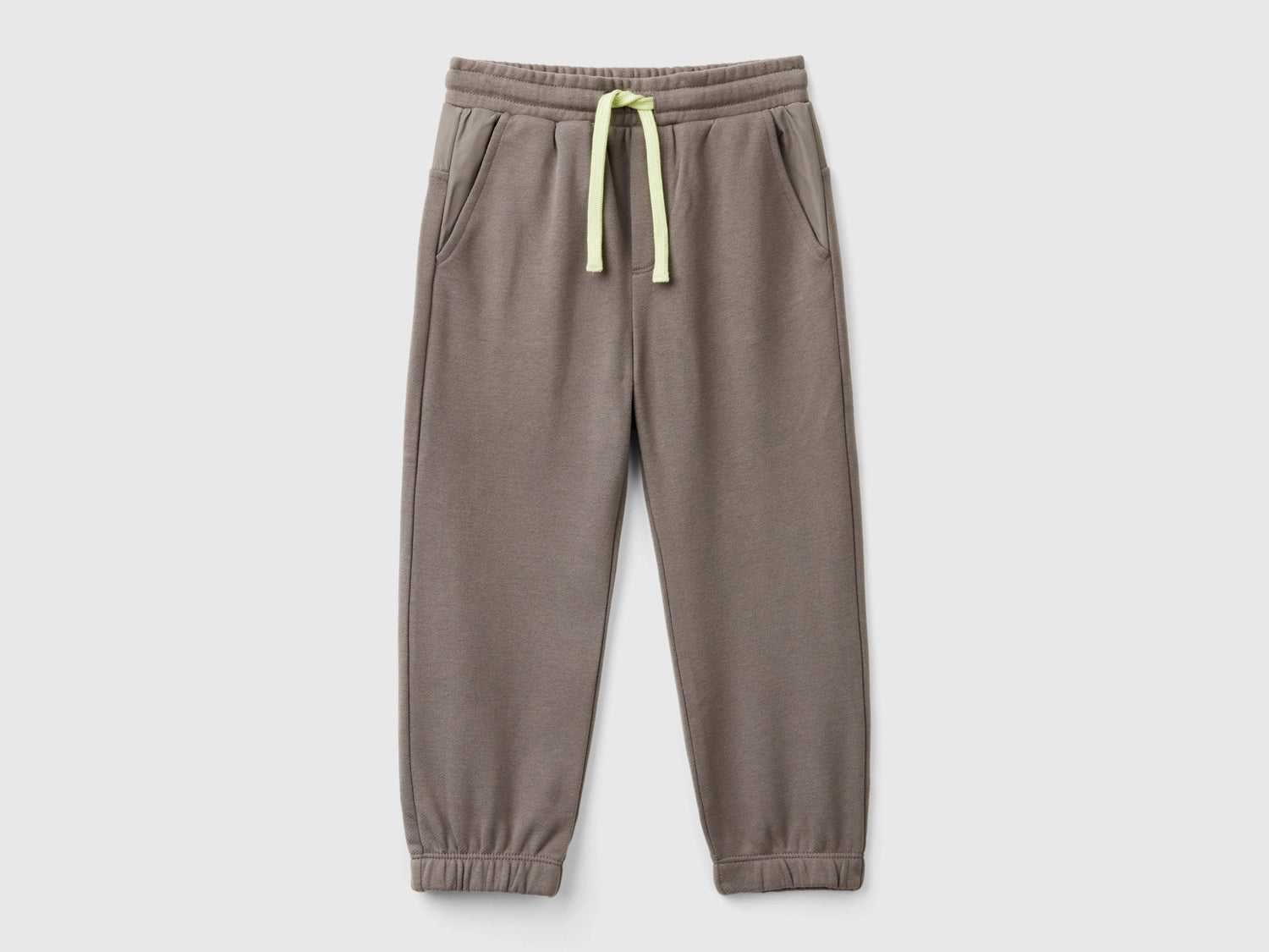Pantaloni in felpa da bimbo grigio scuro | Benetton Outlet