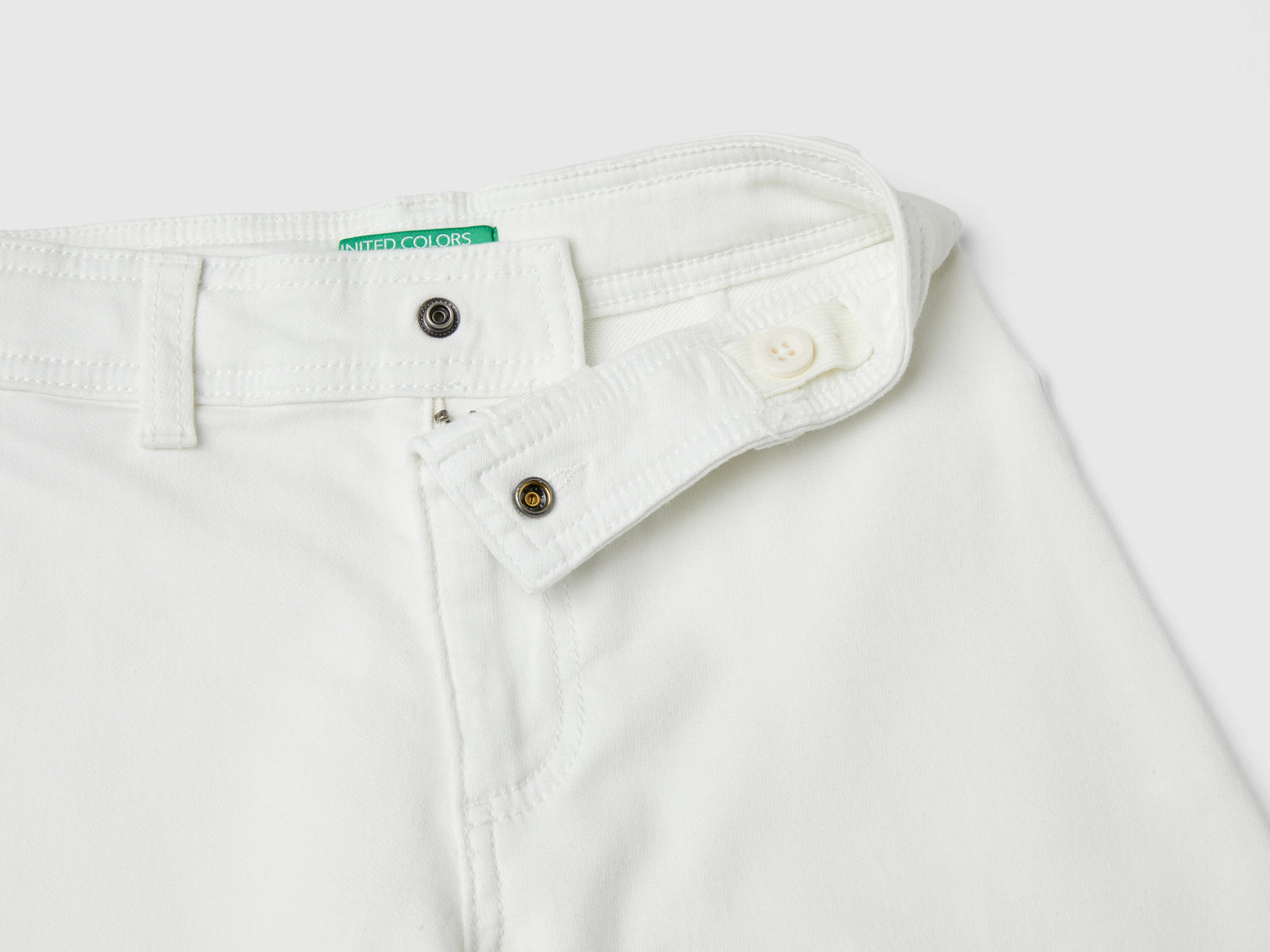Pantaloni ampi in cotone stretch da bambina bianco panna 3 | Benetton Outlet