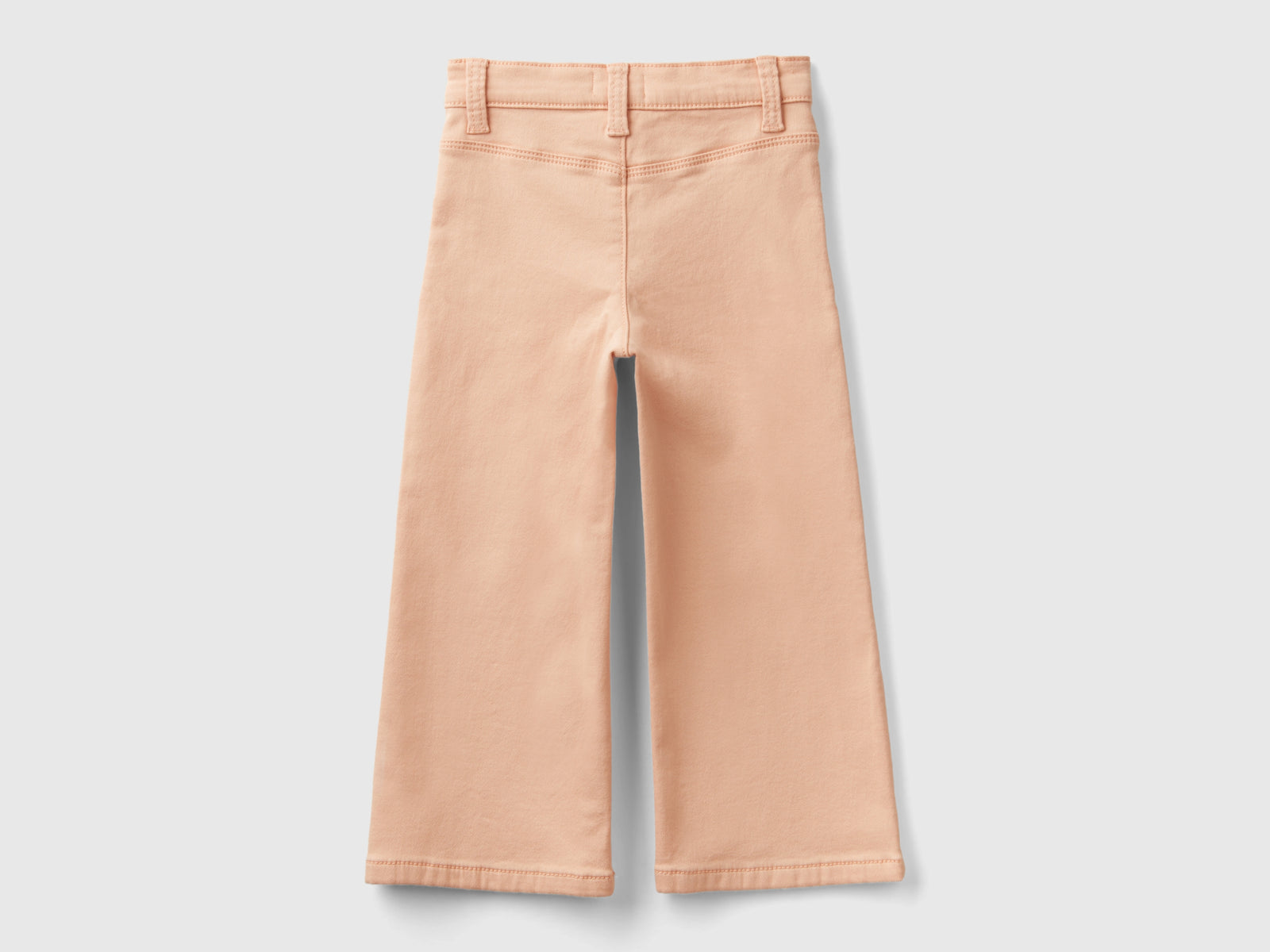 Pantaloni ampi in cotone stretch da bimba rosa tenue 2 | Benetton Outlet