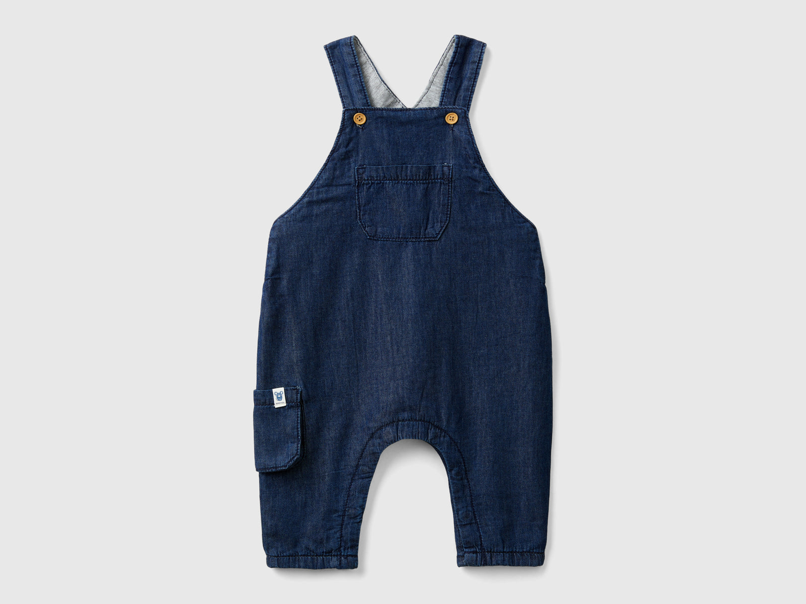 Salopette in chambray da neonato blu | Benetton Outlet