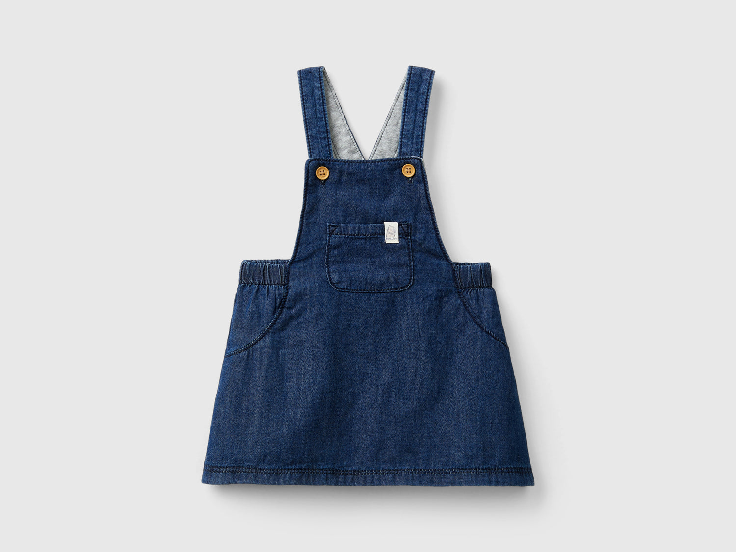 Gonna salopette in chambray da neonato blu | Benetton Outlet