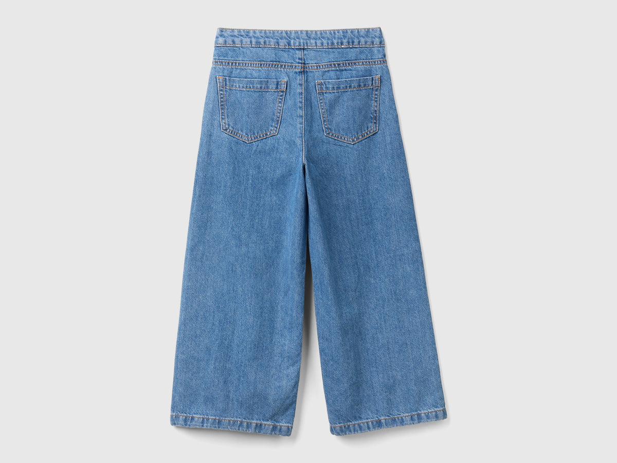 Jeans con applicazioni effetto gioiello