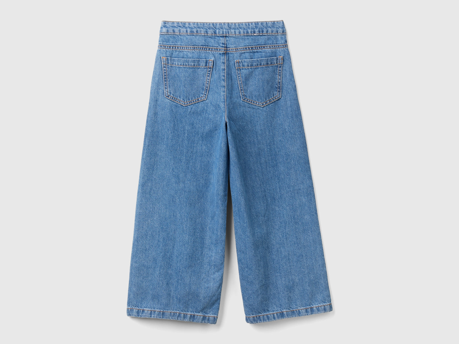 Jeans con applicazioni effetto gioiello da bambina azzurro 2 | Benetton Outlet