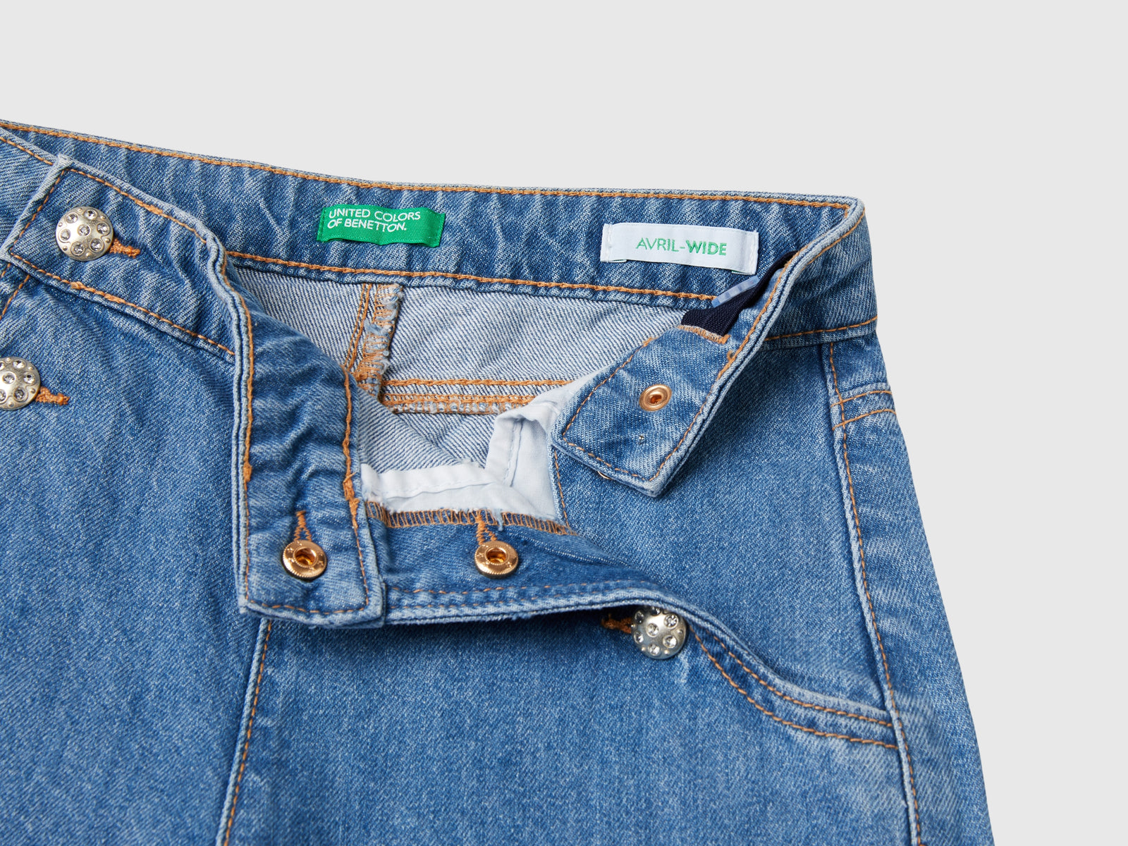 Jeans con applicazioni effetto gioiello da bambina azzurro 3 | Benetton Outlet