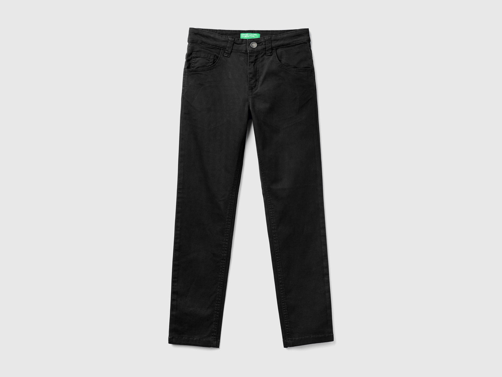 Pantaloni slim fit cinque tasche da bambino nero | Benetton Outlet
