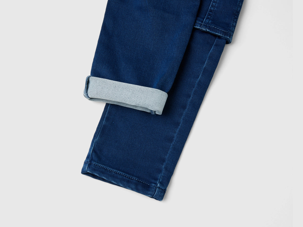 Jeans slim fit con tasconi