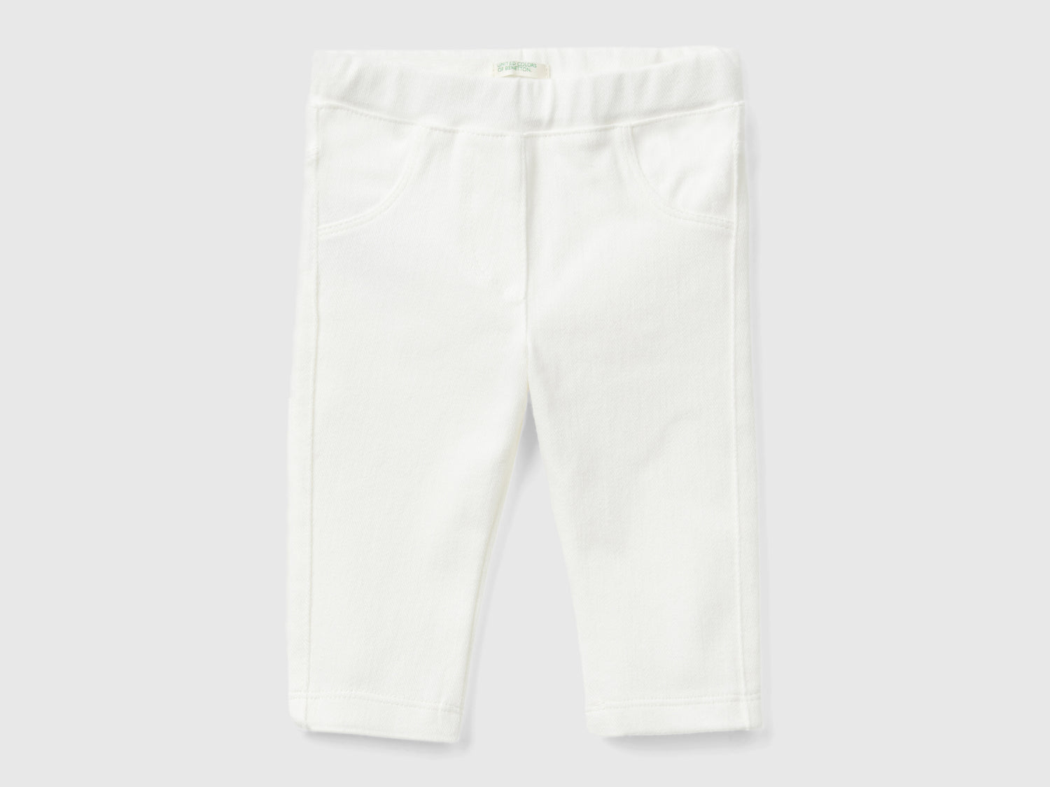 Jeggings super stretch da neonato bianco panna | Benetton Outlet