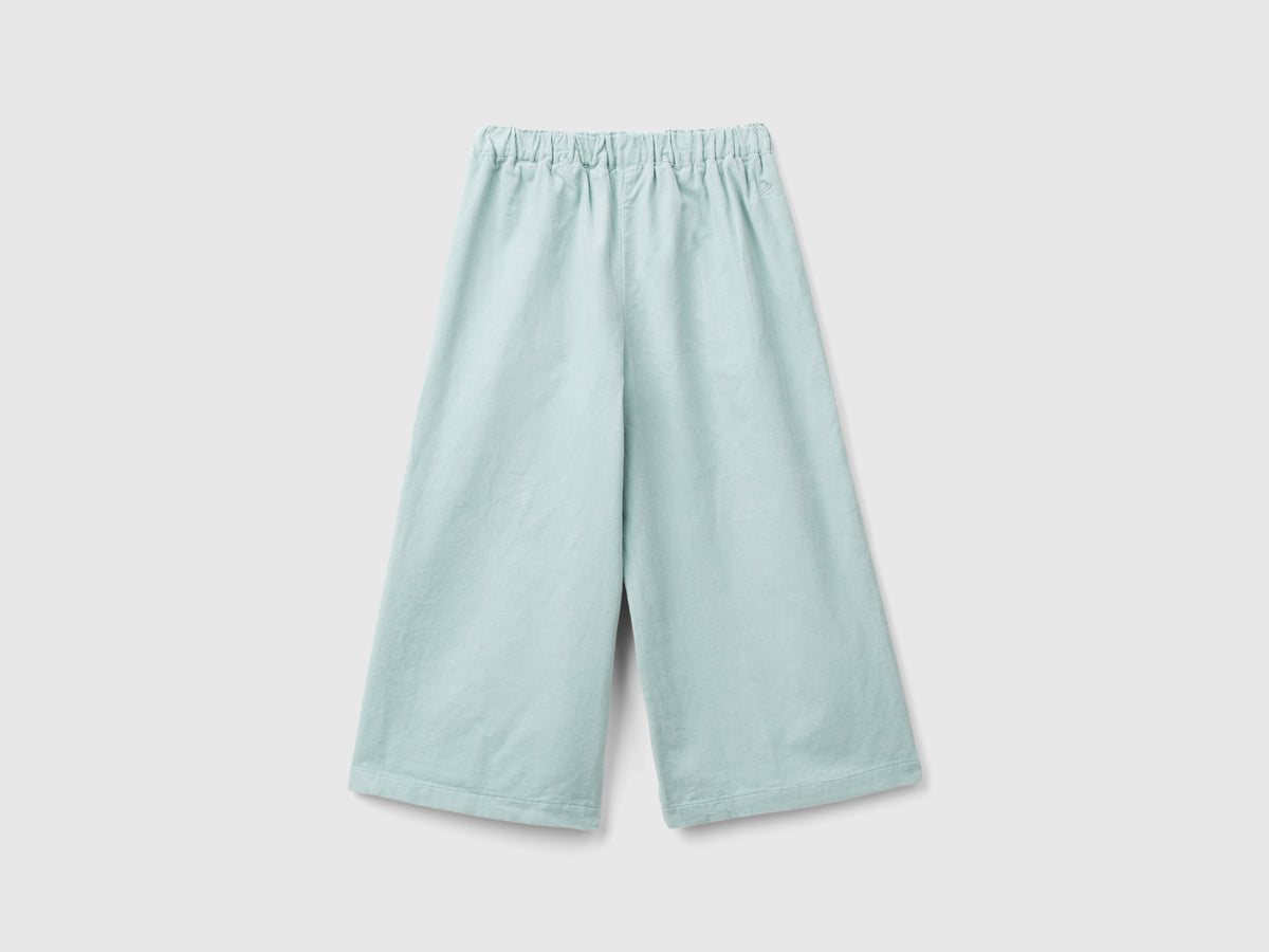 Pantaloni in velluto con bottoni