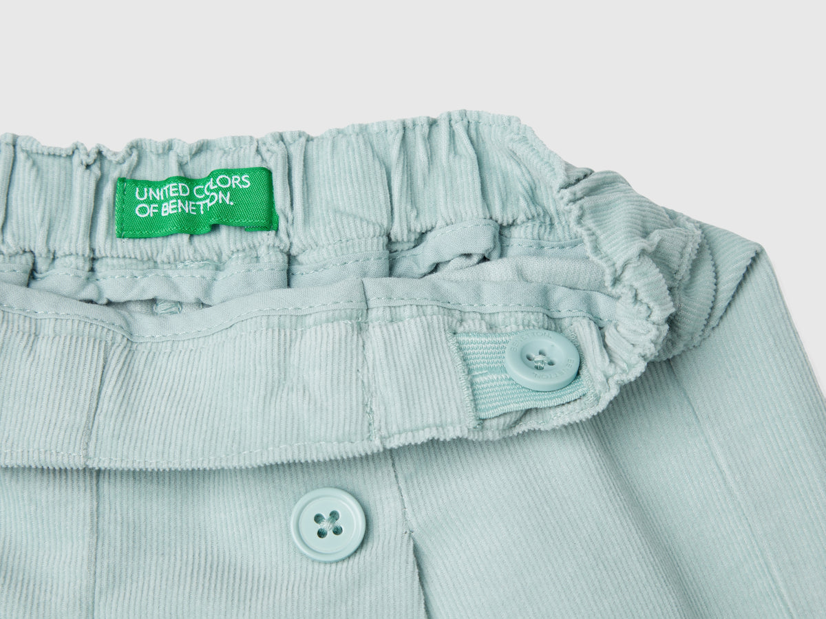Pantaloni in velluto con bottoni