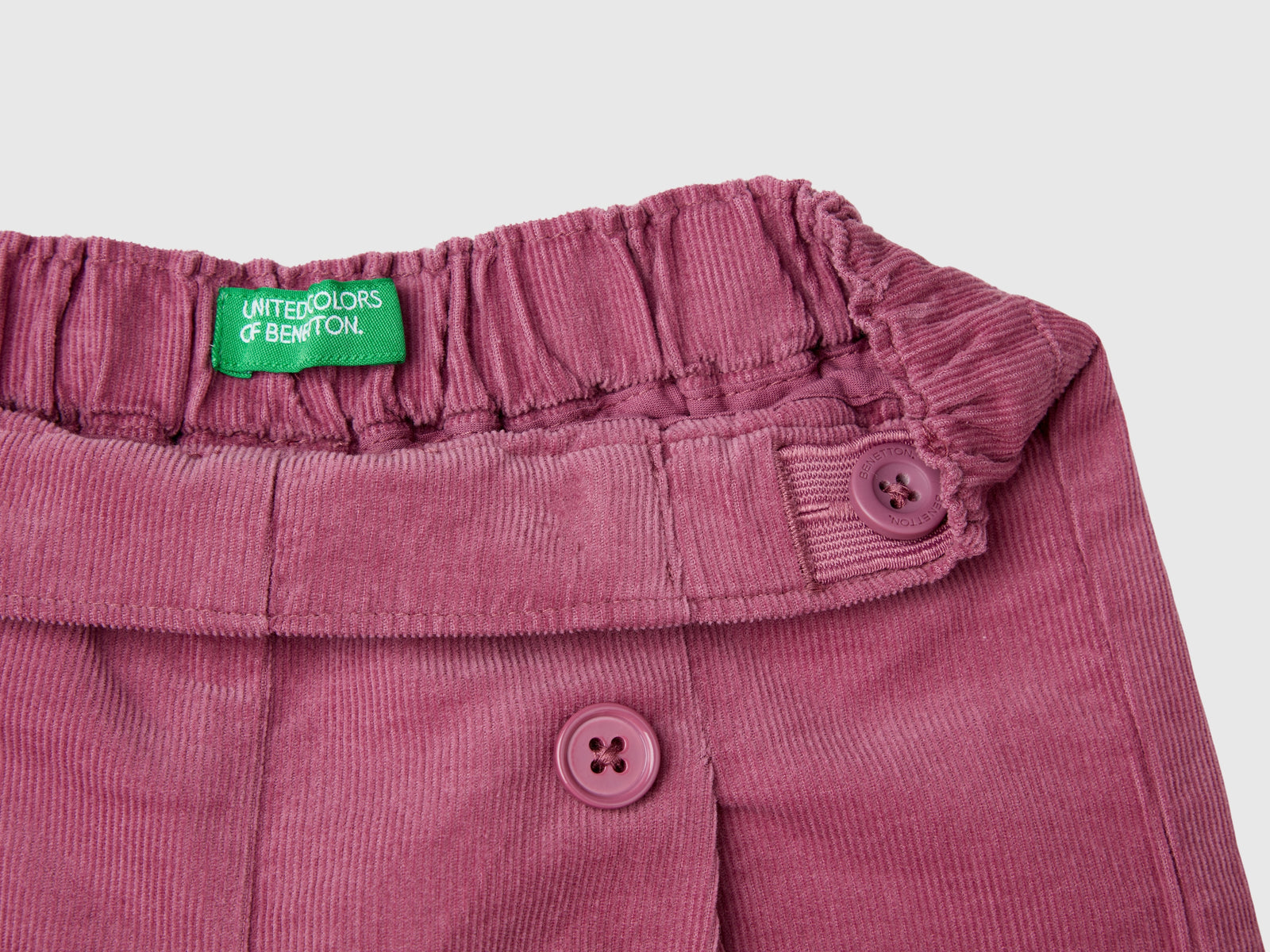 Pantaloni in velluto con bottoni da bimba malva scuro 3 | Benetton Outlet