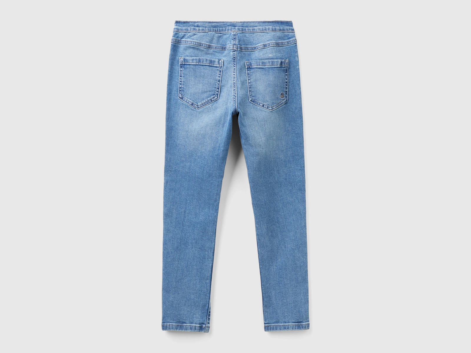 Jeggings in denim stretch da bambina azzurro 2 | Benetton Outlet