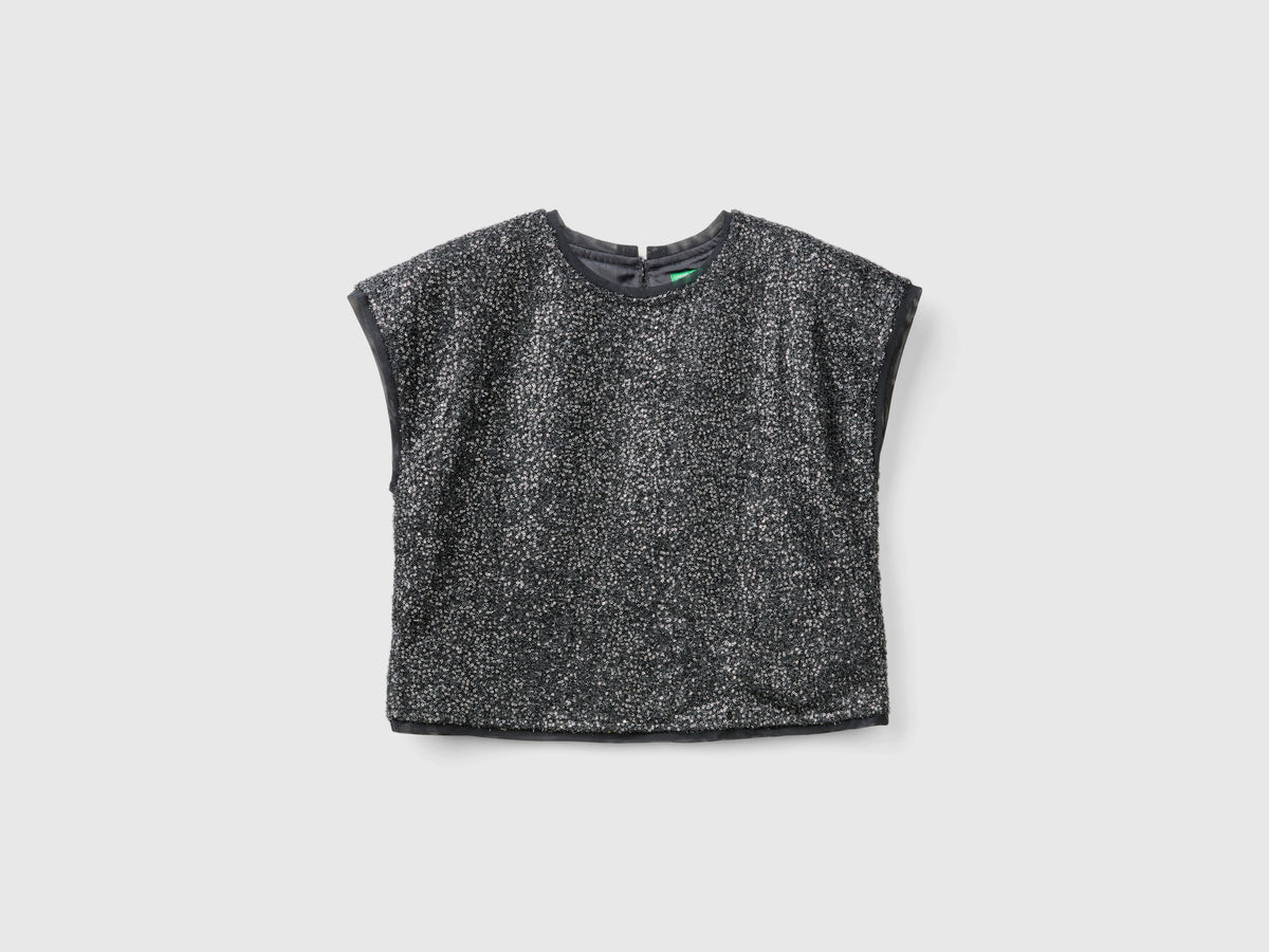 Top boxy fit con paillettes