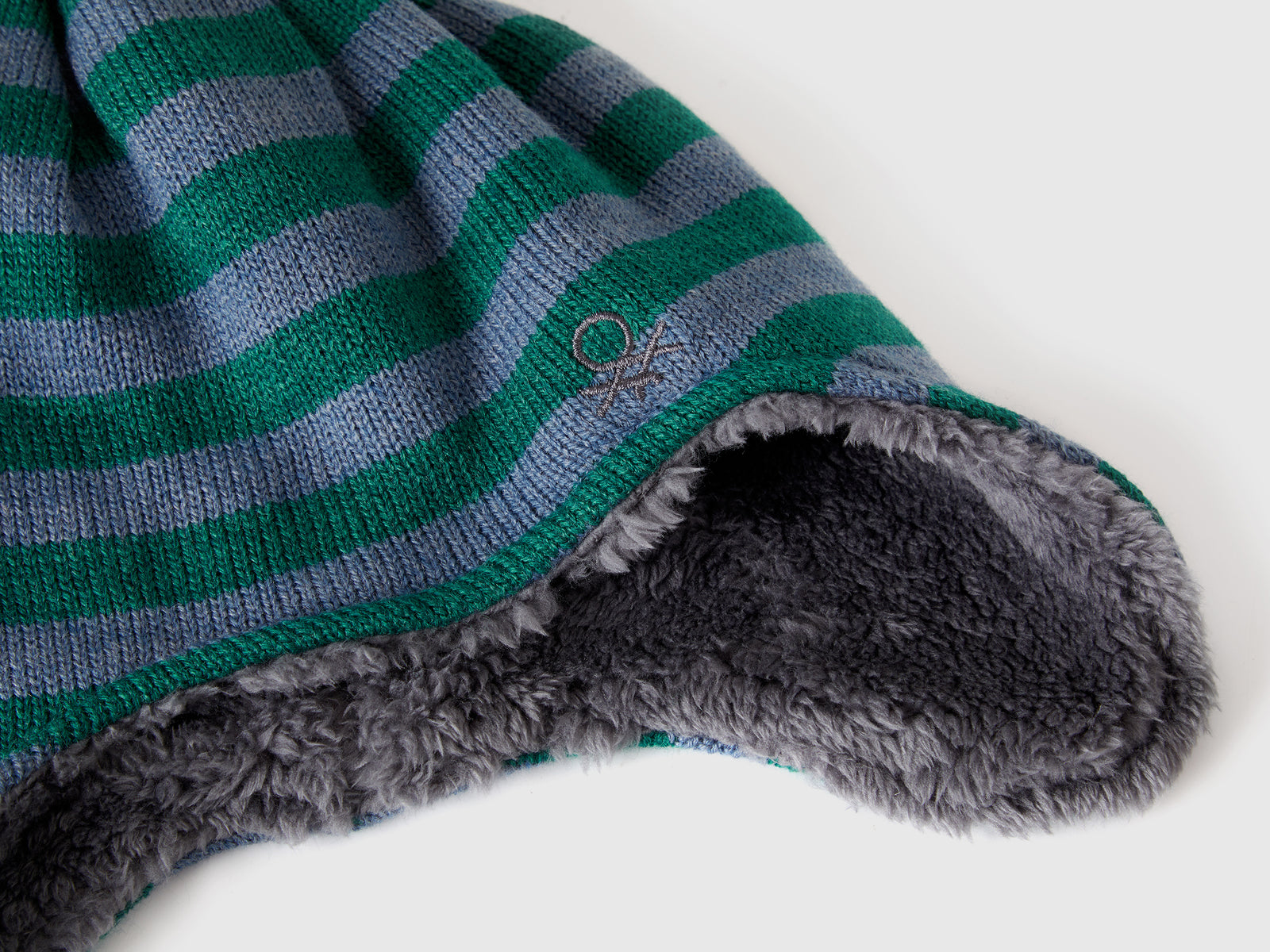 Gorro con orejeras y pompón da bimba verde scuro 3 | Benetton Outlet