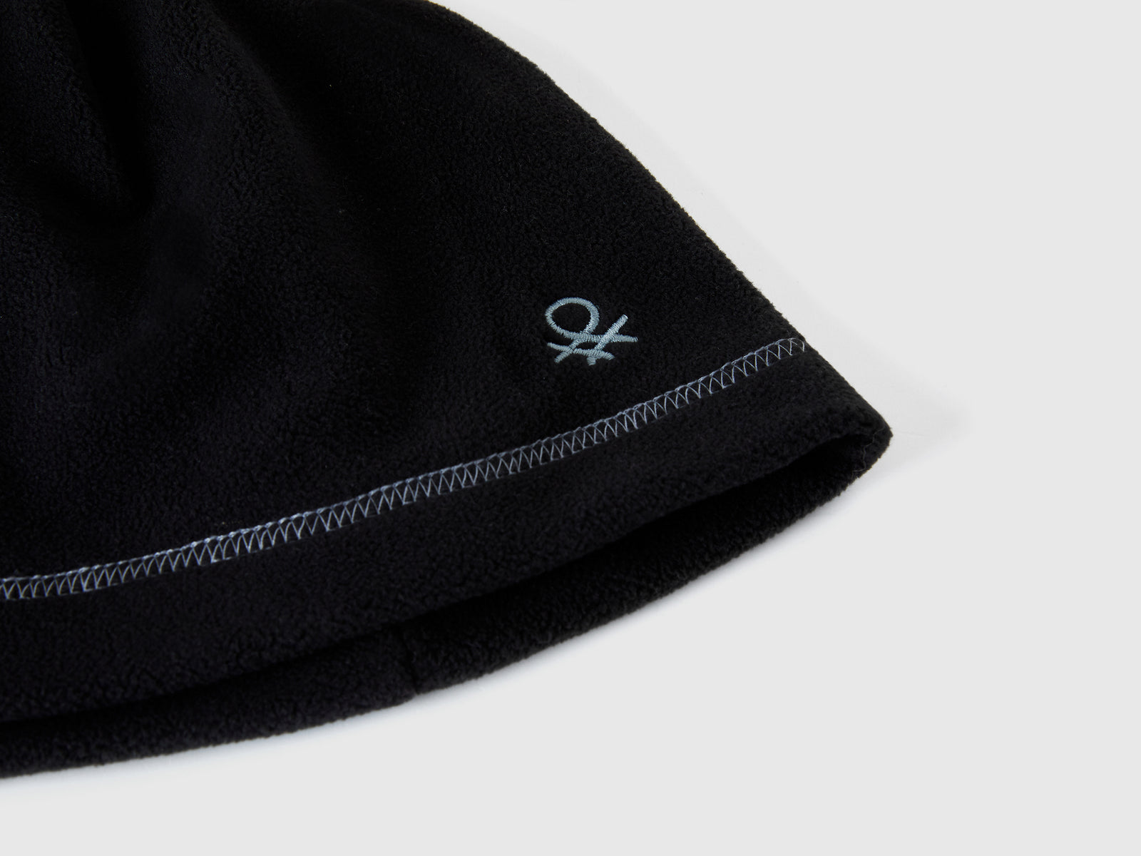 Cuffietta in pile da bambino nero 3 | Benetton Outlet