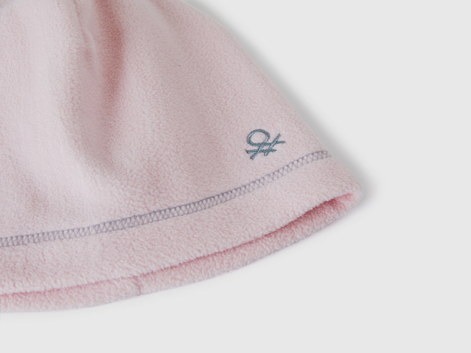 Cuffietta in pile da bambino rosa tenue 3 | Benetton Outlet