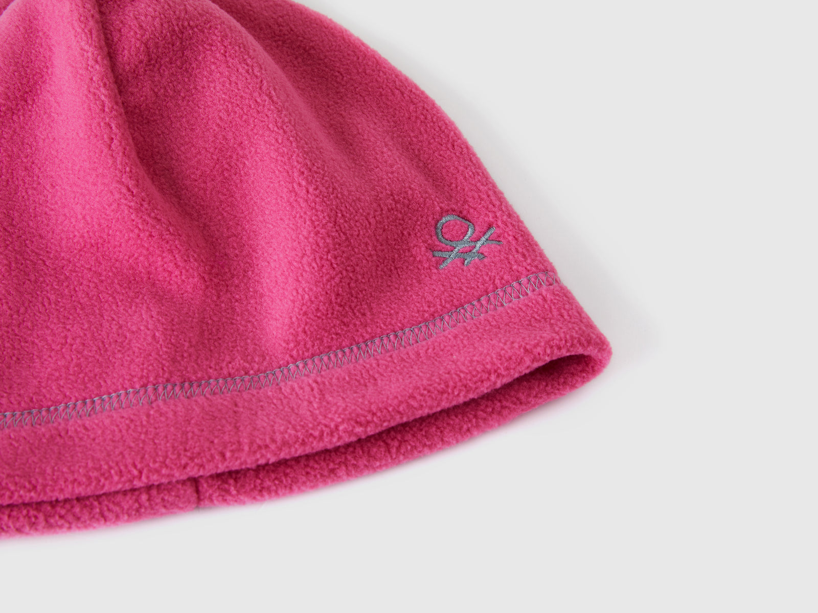 Berretto con logo in pile da bimbo rosa 3 | Benetton Outlet