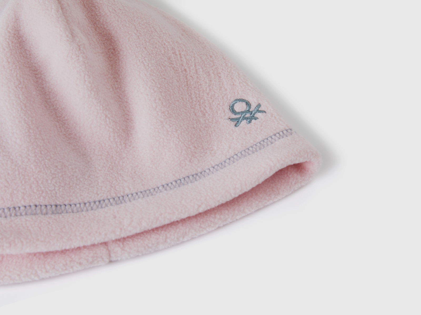 Berretto con logo in pile da bimbo rosa tenue 3 | Benetton Outlet