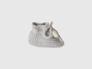 Zapatos hechos a mano con apliques