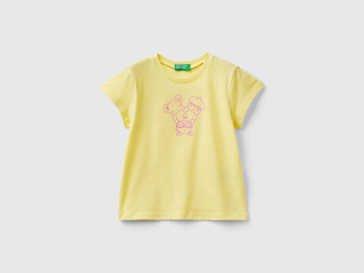 T-shirt 100% cotone con stampa da bimba giallo | Benetton Outlet