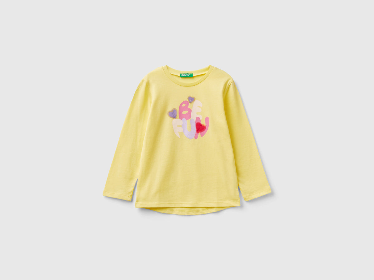 T-shirt con stampa e patch da bimba giallo | Benetton Outlet