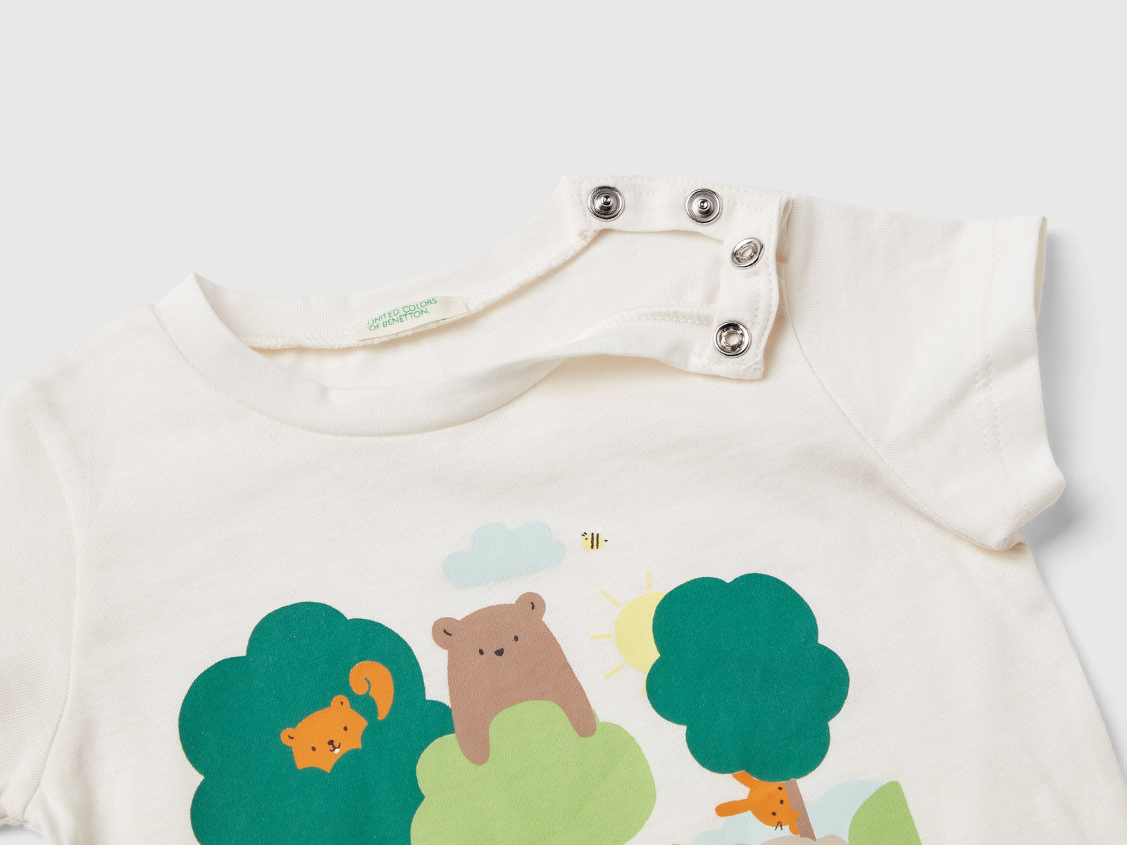 Maglietta in cotone bio con stampa da neonato bianco panna 2 | Benetton Outlet